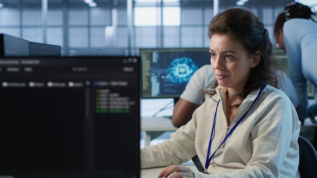 Joyful technician working in high tech data center workspace