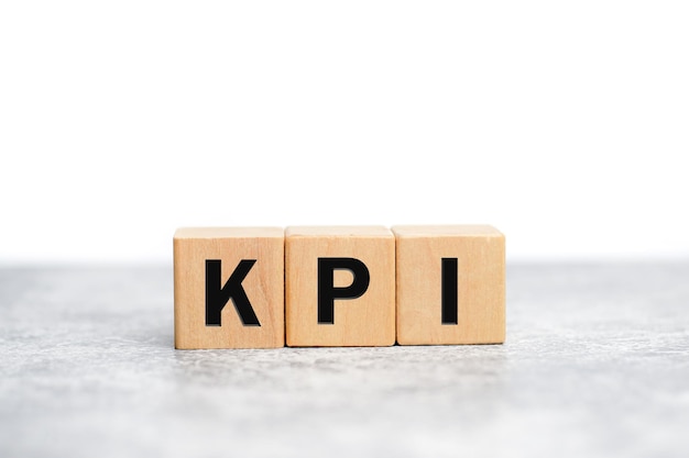 key performance indicator concept text kpi written on wooden cubes on white background business