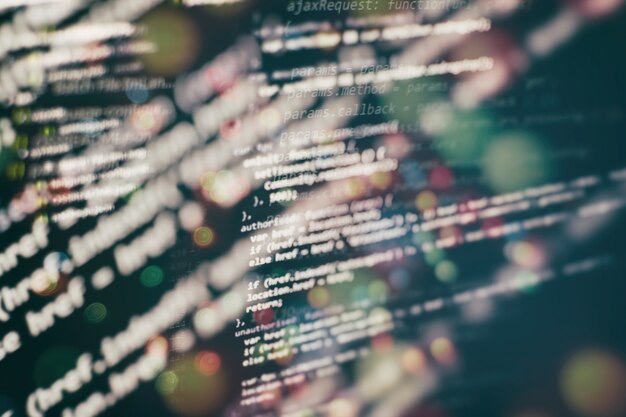 Kode til udviklerprogrammering. Abstrakt computerscriptkode. Programmeringskode på skærmen for softwareudviklere. Tid til softwareprogrammering.