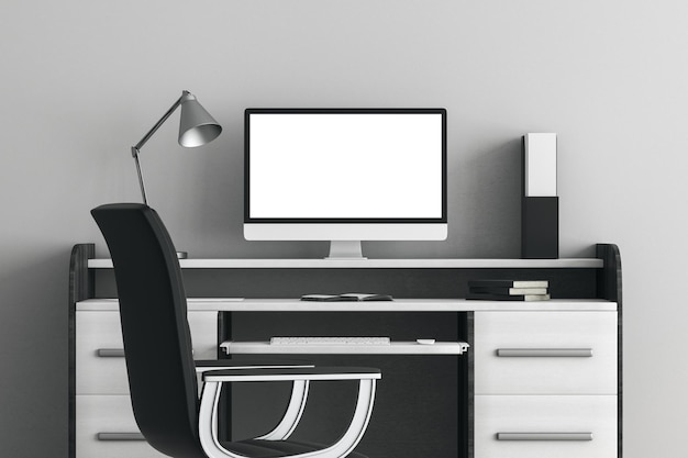 Kreativt arbejdsområde med hvid laptop