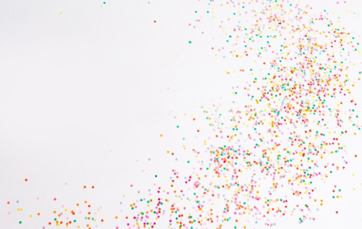 Bild lots of bright christmas confetti on the table