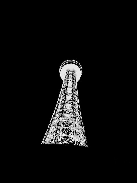 Low angle view of tower at night