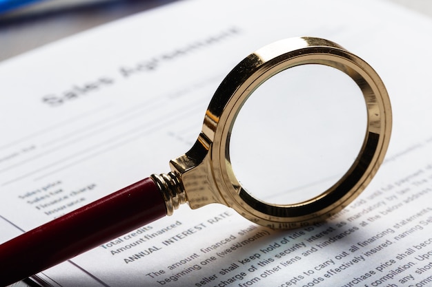 Magnifying Glass and document close up