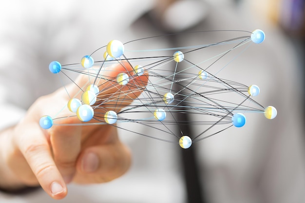 Males hand pointing to an illustration of computering cloud computing and files
