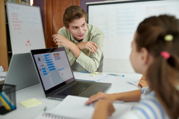 Man conducting business meeting with colleagues