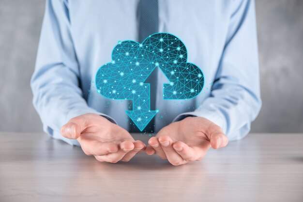man hold cloud icon technology. polygonal wireframe cloud storage sign with two arrows up and down. cloud computing, big data center, future infrastructure, digital ai concept. virtual hosting symbol