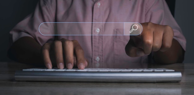 Man presses the information search button on computer virtual screen