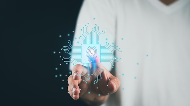 Mans hand scanning finger to go online to access information both accessing the system