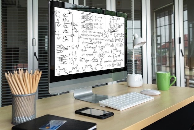 mathematic equations and modish formula on computer screen showing concept of science and education