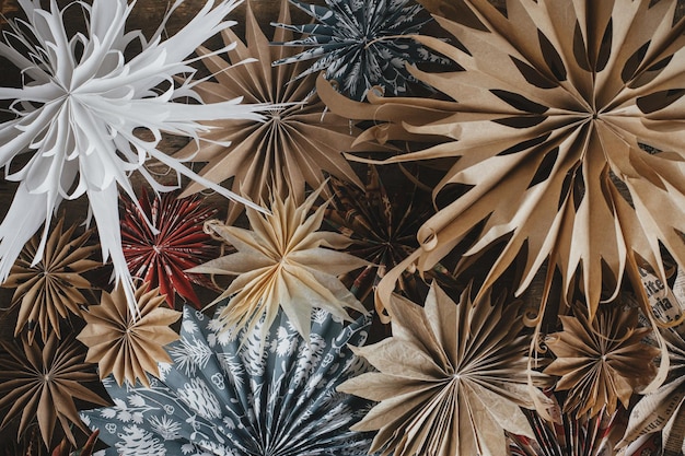 Merry Christmas Stylish Christmas stars flat lay on rustic background Scandinavian modern decor