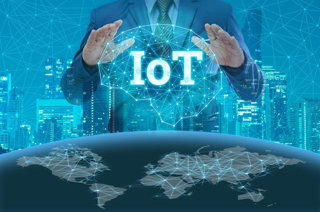 Midsection of businessman touching shape with text with city background