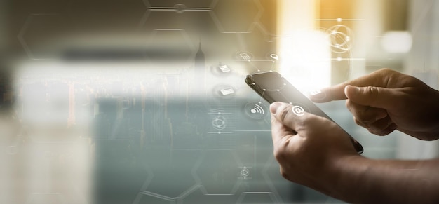 midsection of man using mobile phone