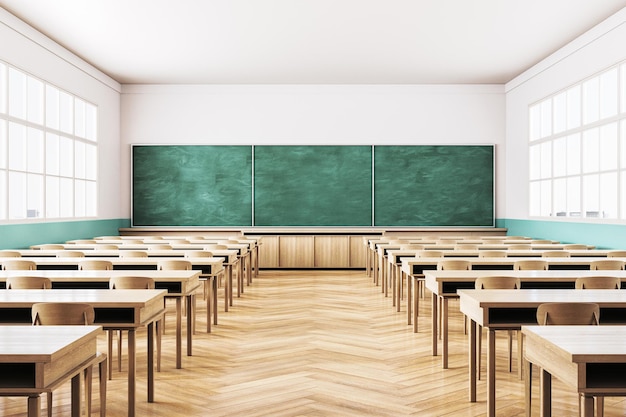 modern classroom interior with empty desks and large chalkboard 3d rendering