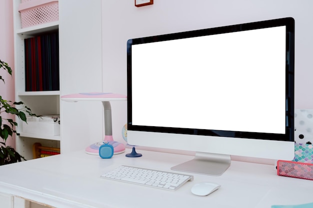 Modern teen room monitor keyboard mouse on desk white screen with space for content