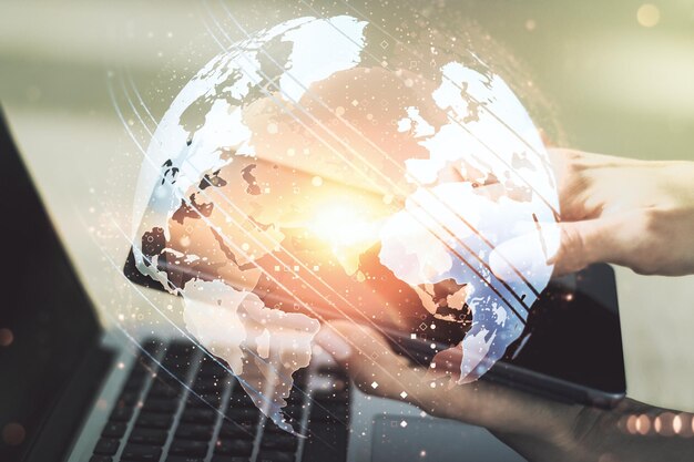 Multi exposure of abstract creative digital world map and finger presses on a digital tablet on background research and analytics concept
