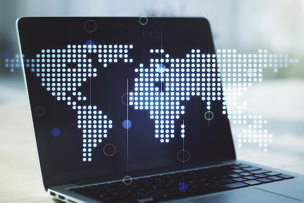 Multi exposure of abstract creative digital world map on modern laptop background tourism and traveling concept