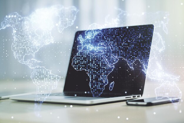 Multi exposure of abstract creative digital world map on modern laptop background tourism and traveling concept