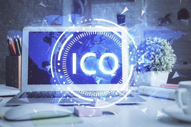 Multi exposure of blockchain and crypto economy theme hologram and table with computer background Concept of bitcoin cryptocurrency