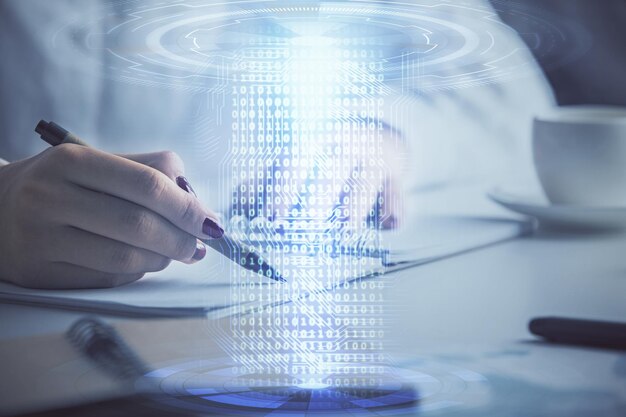 Multieksponering af en kvindes skrivende hånd på en baggrund med data teknologi hologram. Koncept for innovation
