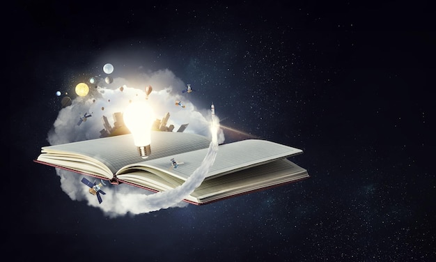 Open blank notebook on dark space fantasy background and planet model