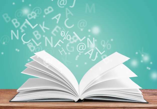 Open book with letters flying away Education concept