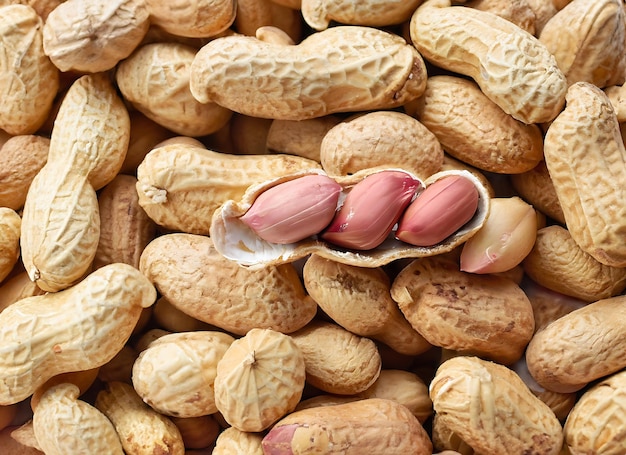 Peeled peanut on well peanuts Peanuts for background or textures
