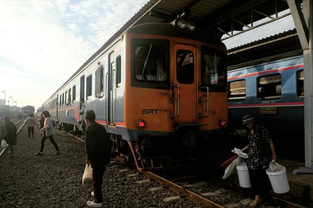 people by train against sky