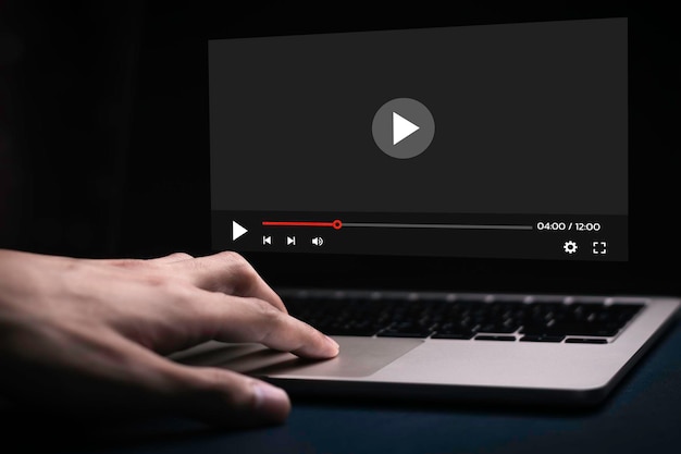 Person using computer for watching video on the internet watch movies listen to music for entertainmentlive contentshow or tutorialstream gamesrecord voice content streamingxA