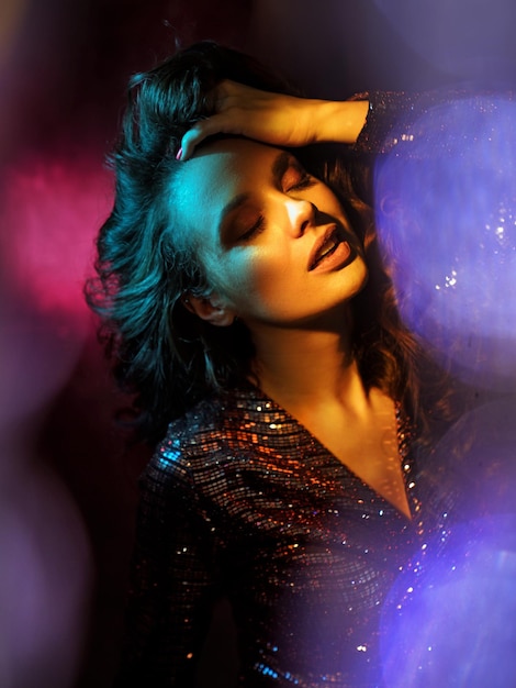 portrait of beautiful young woman with eyes closed