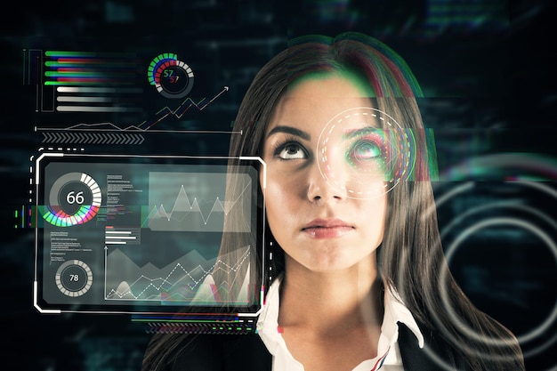 Portrait of businesswoman with creative eye scanning interface hud screen on dark background Biometrics ID concept Double exposure