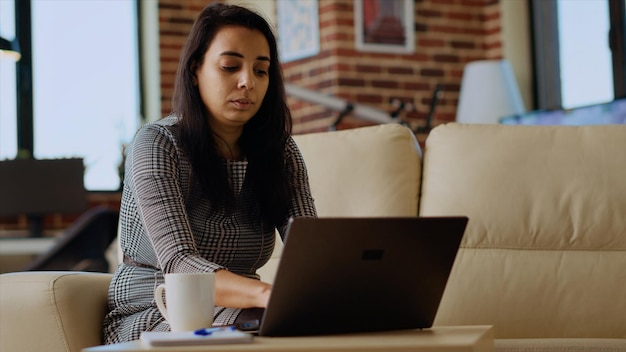 Portrait of happy remote worker enjoying stay at home freelancing job