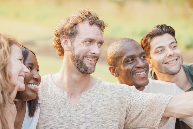 Portrait of smiling friends looking away