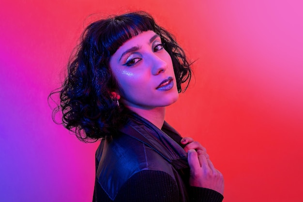 portrait of smiling modern woman with trendy look and bright colors