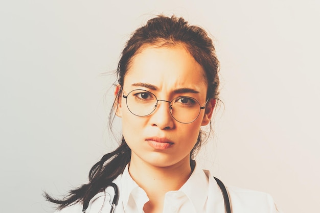 portrait of teenage girl against white background