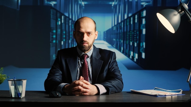 POV of database admin talking on remote videocall in data center storage room, technician working in artificial intelligence render farm. IT administrator using online videoconference call.