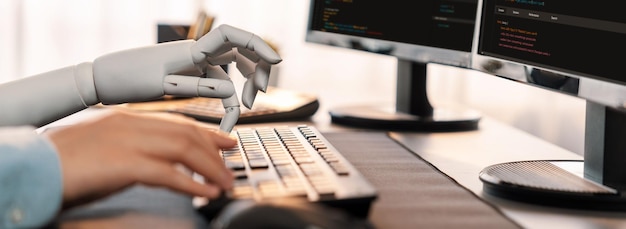 Program coding automation by generative artificial intelligence or AI concept Collaboration between robotic hand and human software developer solving debugging or writing scriptTrailblazing