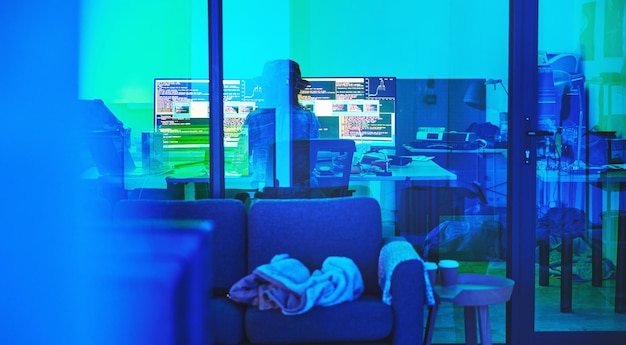 Programmer back or computer screen in neon programming cybersecurity ransomware or SEO night phishing in basement Hacker developer or woman on technology coding for dark software iot bug or scam