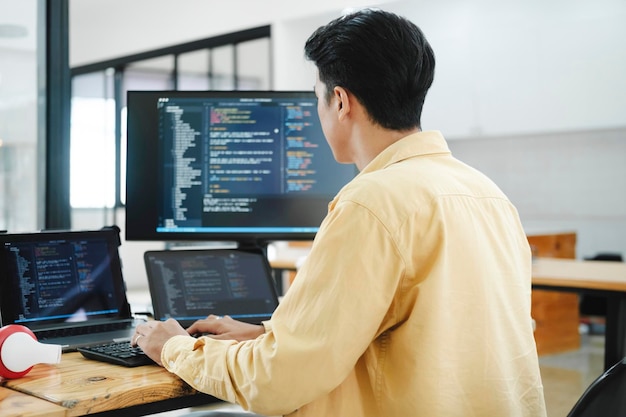 programmer coding and developing software or application project