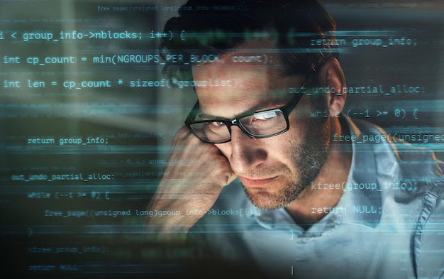 Programmer man thinking of network coding solution at night in cloud computing 404 pc glitch