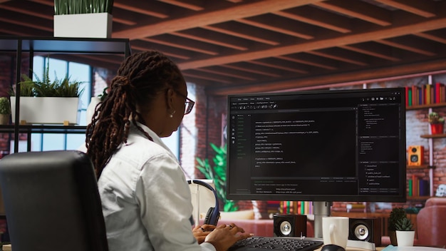 Programmer types code into PC entering commands running script