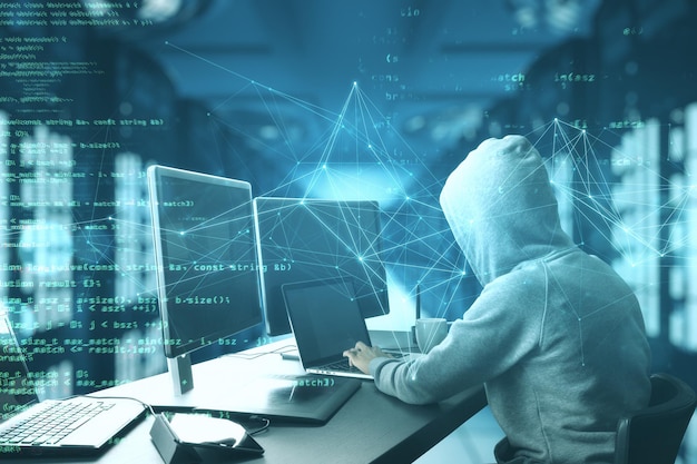 Programmer using computer with html code