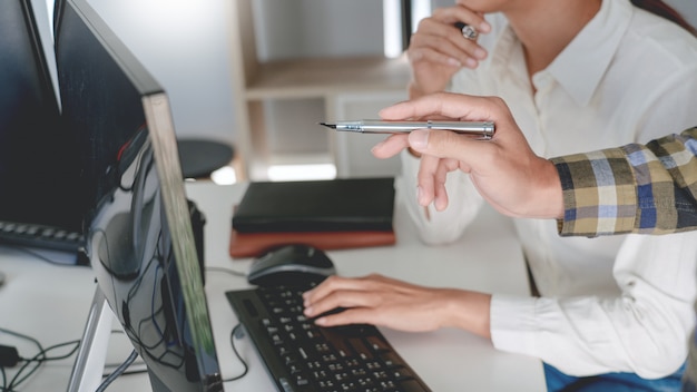 Programmers developing codes on their computers