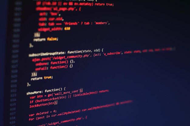 Programming code on computer screen. Software development. Writing program code on computer.