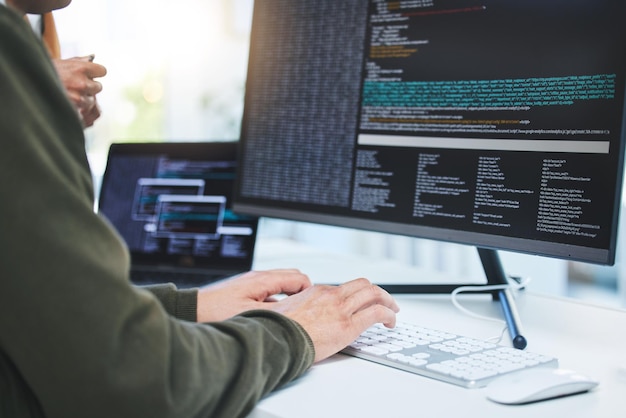 Programming developer and hands on computer for coding software script or cyber security in office Closeup of IT technician person with technology for typing code future and data analytics
