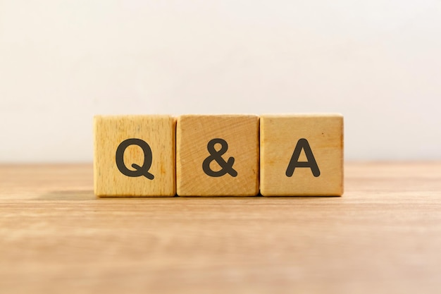 Question and answer or Q and A written on wooden blocks