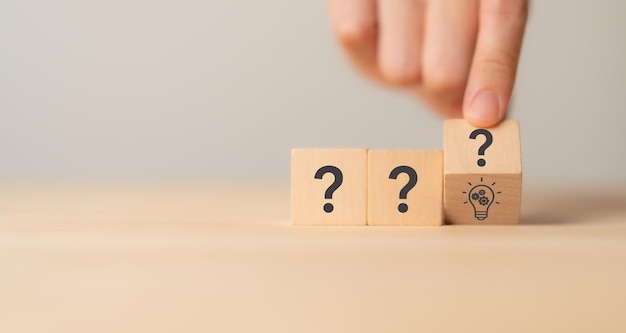 question marks and light bulb symbolizing idea or solution problem solving skill creativity innovation brainstorming critical thinking and root cause analysis concept question idea and answer