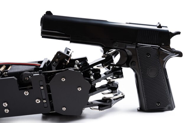 real robot's hand with handgun aiming in wrong direction concept of artificial intelligence fatal error