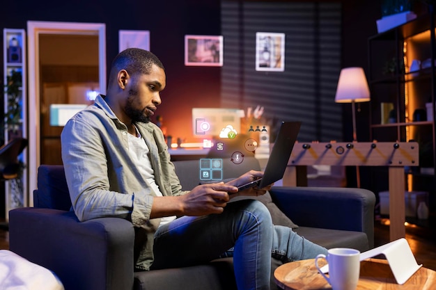 Remote employee using AR technology to interact with laptop software