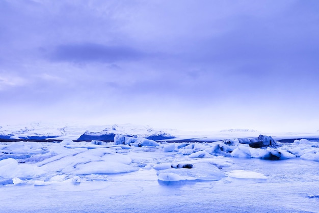 Scenic view of glacier against sky