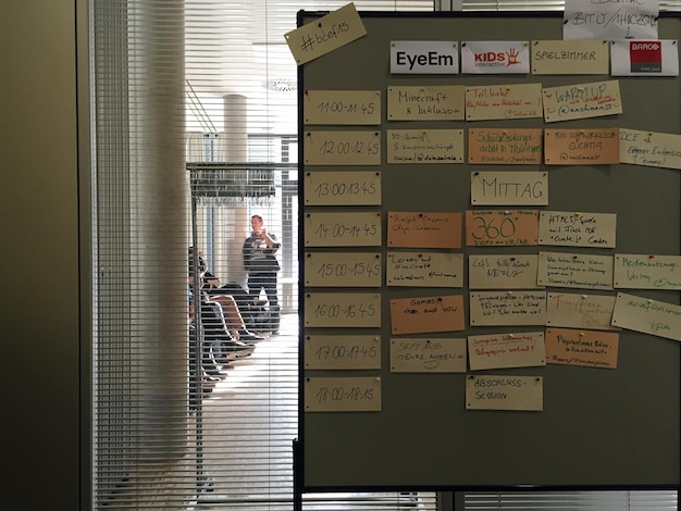 Schedule notes on bulletin board at office